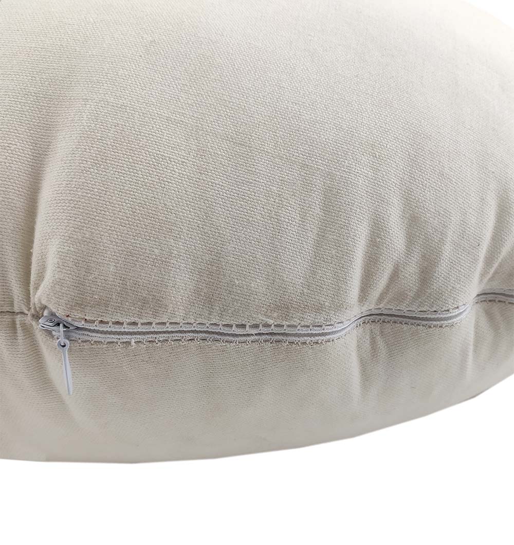 A close-up of the RAMSHA HOME Round Cotton Cushion CS-225 showcases its beige fabric, visible zipper along one seam, and detailed stitching on the cushion cover.