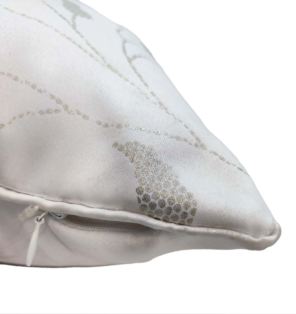 A close-up of the RAMSHA HOME Polyester Cushion With Gold Floral Foil Print (CS-242) shows a partially open zipper along the seam, revealing the cushion insert inside.