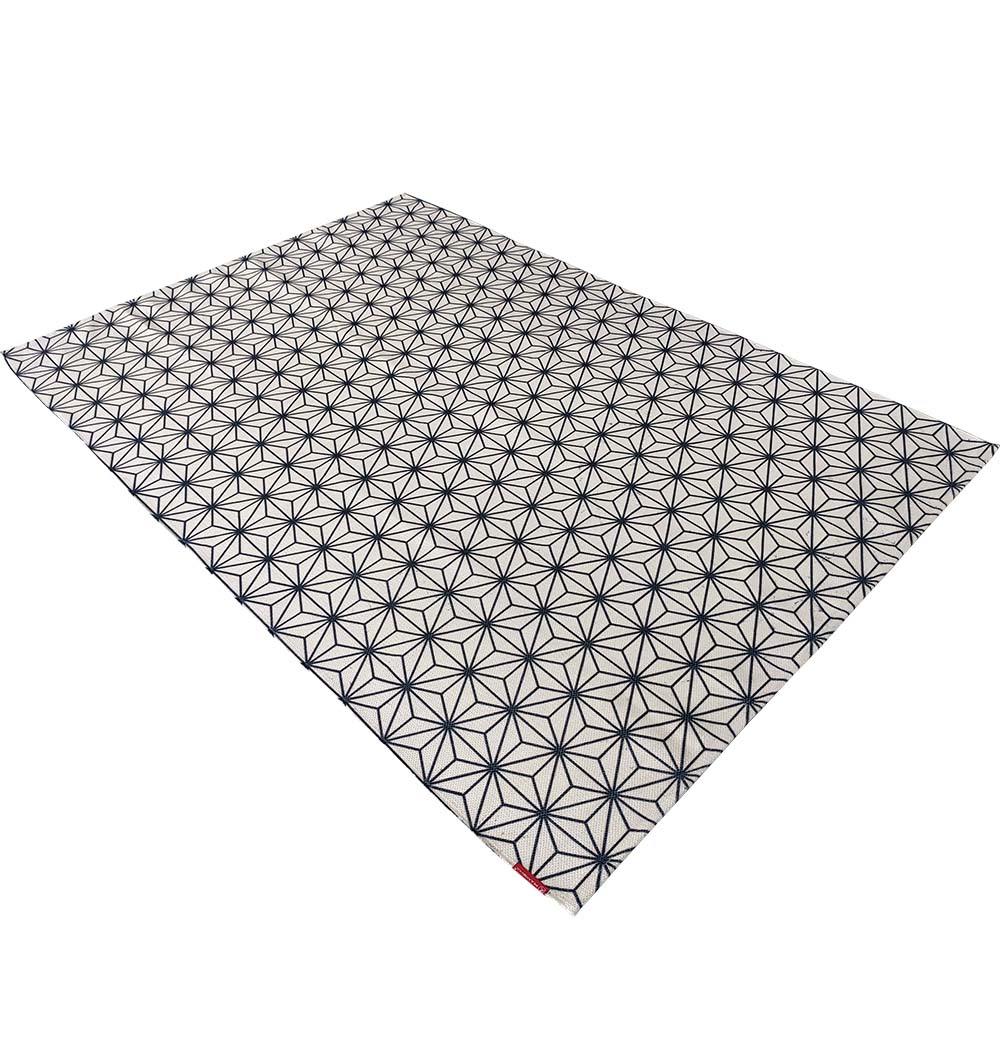 The RAMSHA HOME Geometry Pattern Printed Durry in white and black (140x200 cm, DD-006) features a repeating star design with a small red tag accenting one edge, adding style to this modern rug.