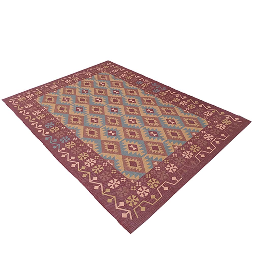 The RAMSHA HOME Multi Color Digital Printed Rug Maroon Rug DD-018 features geometric diamonds and triangles in gold, blue, and burgundy tones with intricate borders on a reddish-brown background.