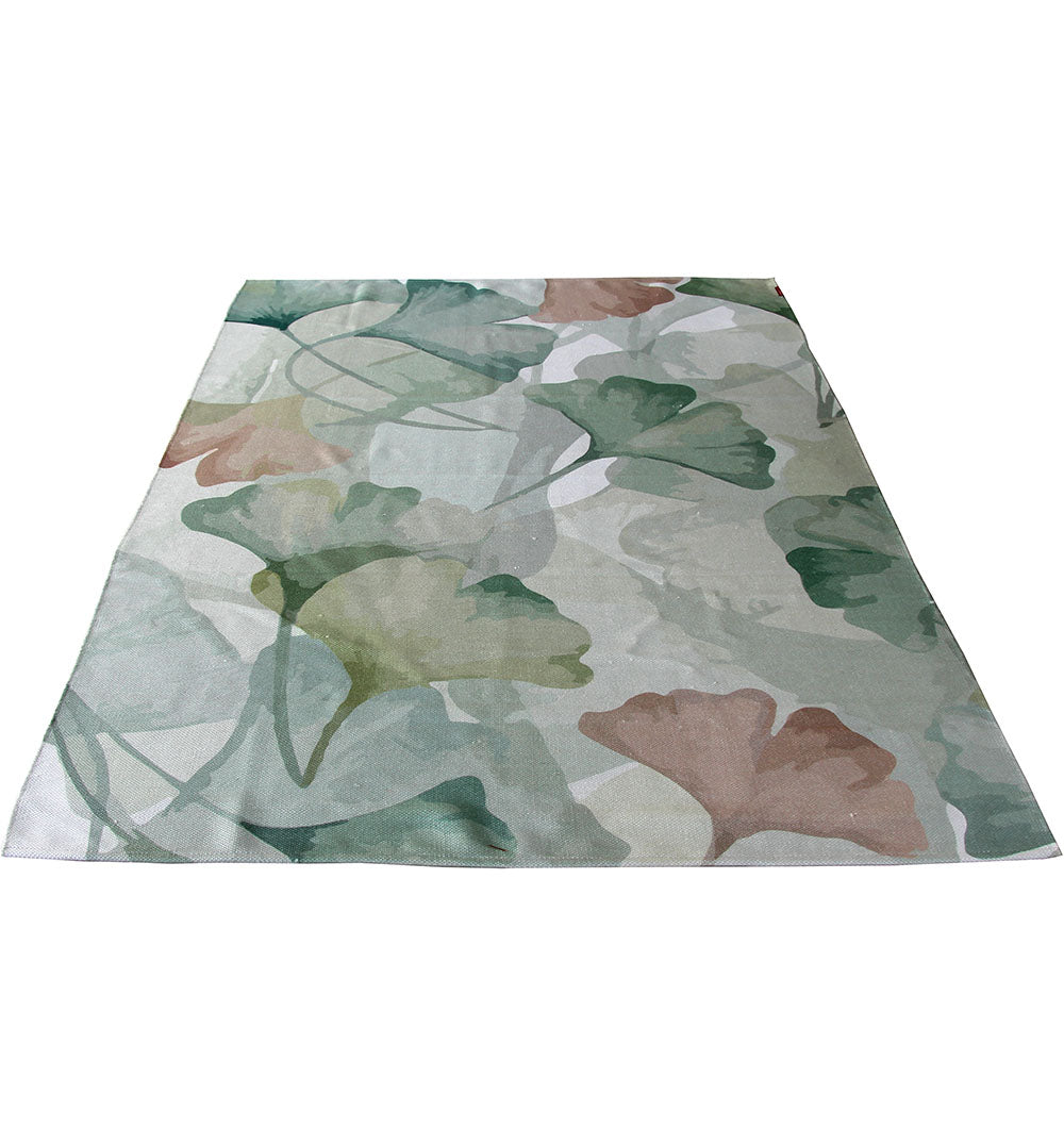 The RAMSHA HOME Floral Printed Area Rug Multi Color 150x210 cm (DD-031) features a digital printed dhurry design with overlapping green, beige, and muted pink leaves on a light background.