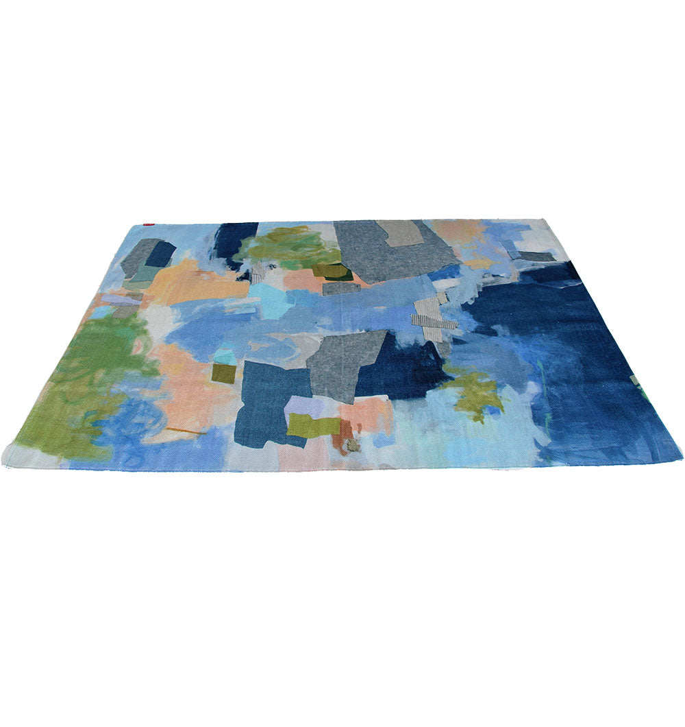 The RAMSHA HOME Multi Color Decor Area Rug 150x210 cm (DD-037) features blue, green, beige, and peach geometric and brushstroke patterns on a white background in a modern design. This digitally printed dhurry is shown on a plain surface.