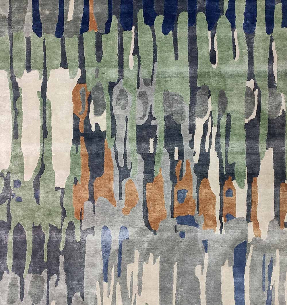 The RAMSHA HOME Decorative Area Carpet Tencil & Cotton Multi Color HKV-09 features an abstract pattern of vertical streaks in green, blue, beige, gray, and brown for a contemporary artistic touch in any space.