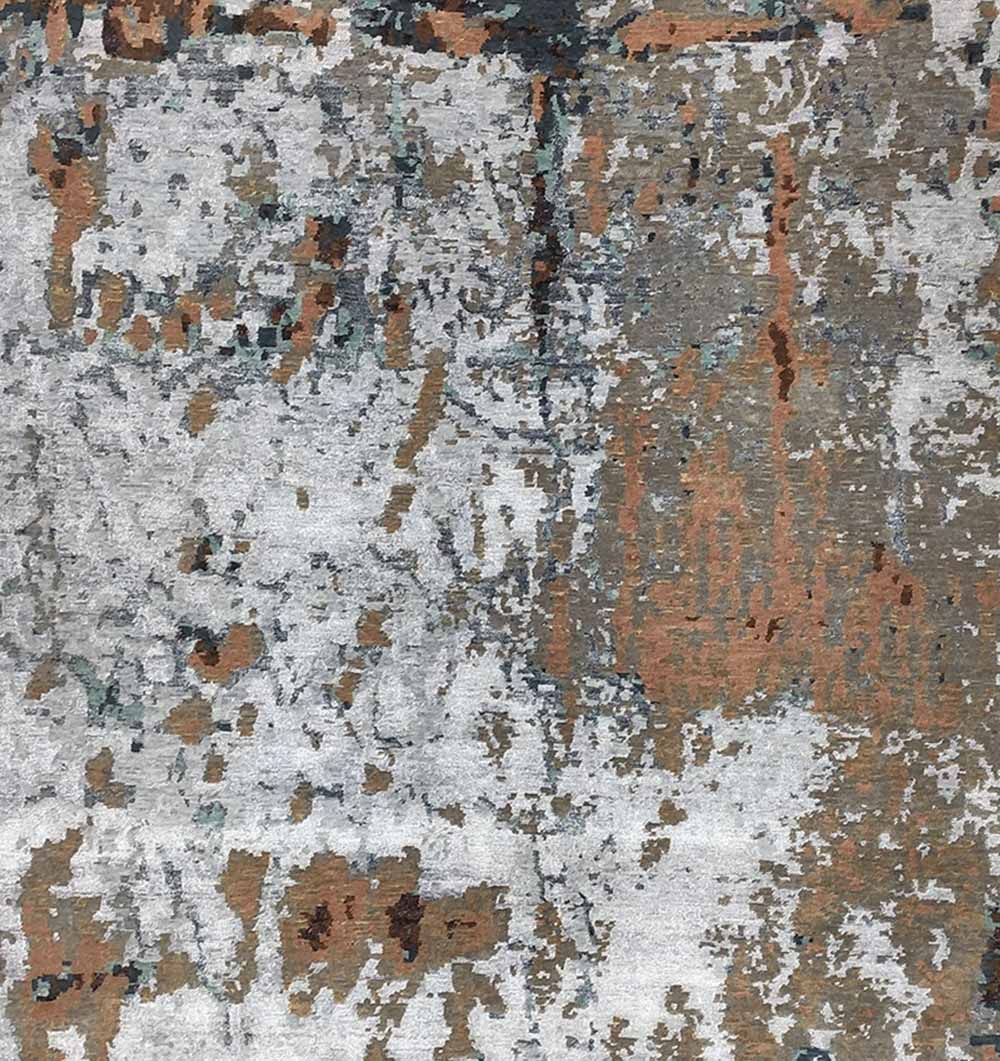 The RAMSHA HOME Bamboo Silk & Cotton Hand Knotted Carpet HKWB-012 features an abstract blend of gray, white, brown, and blue hues with irregular shapes and a weathered charm, reminiscent of distressed paint or intricate hand-knotted patterns.