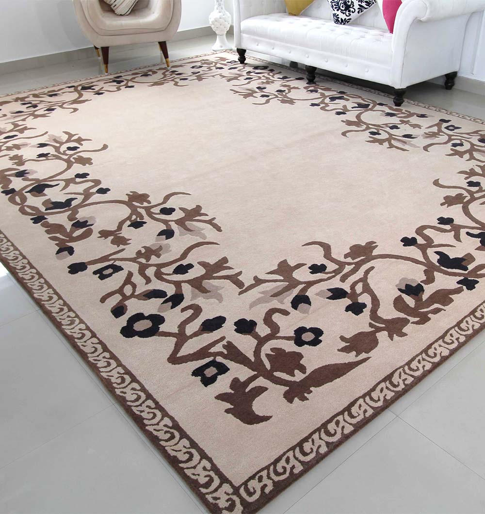The RAMSHA HOME Multi Color Handmade Carpet 300X400 CM HTW-05 adds style to a living room with a white sofa and beige armchair set on light tile floors.