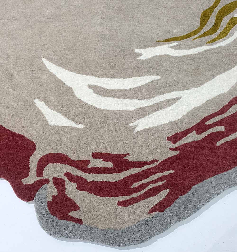 The RAMSHA HOME Handmade Multi Color Carpet HTW-60 features irregular wavy edges and abstract brushstroke shapes in beige, white, red, and yellow, creating a modern artistic look in a wool blend.