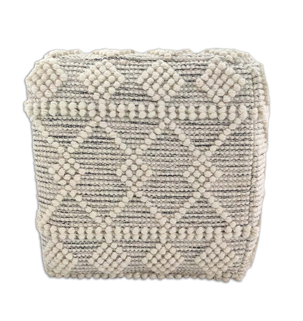 A cream geometric diamond throw pillow with tufted details and pompom accents pairs perfectly with the RAMSHA HOME Woven Natural Pouf With Polystyrene Bag PF-013 for cozy, stylish comfort.