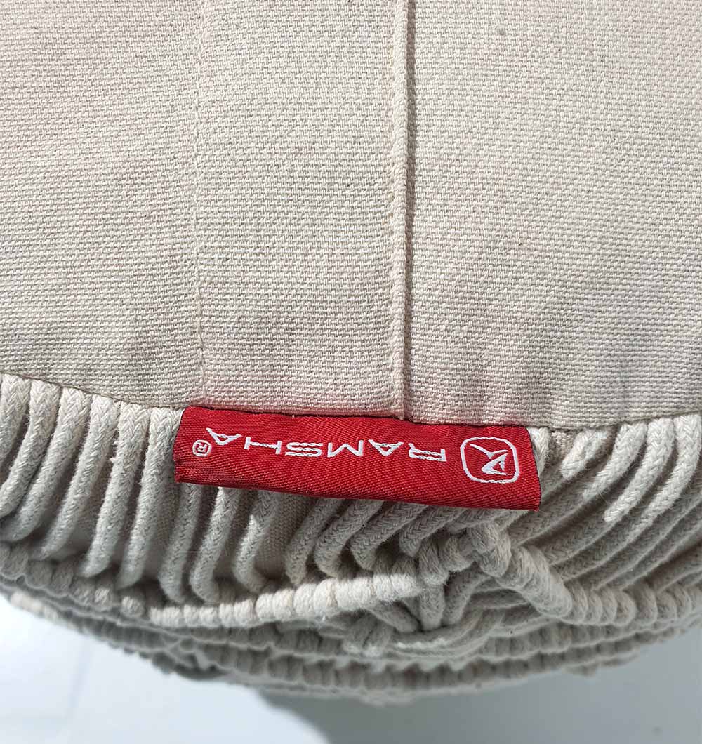 Macro shot of PF-070 pouf showing natural cotton fibers and thermocol filling