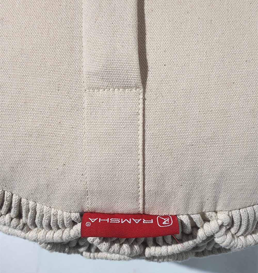 Rear side of handmade PF-073 cotton pouf highlighting thermocol filling and texture