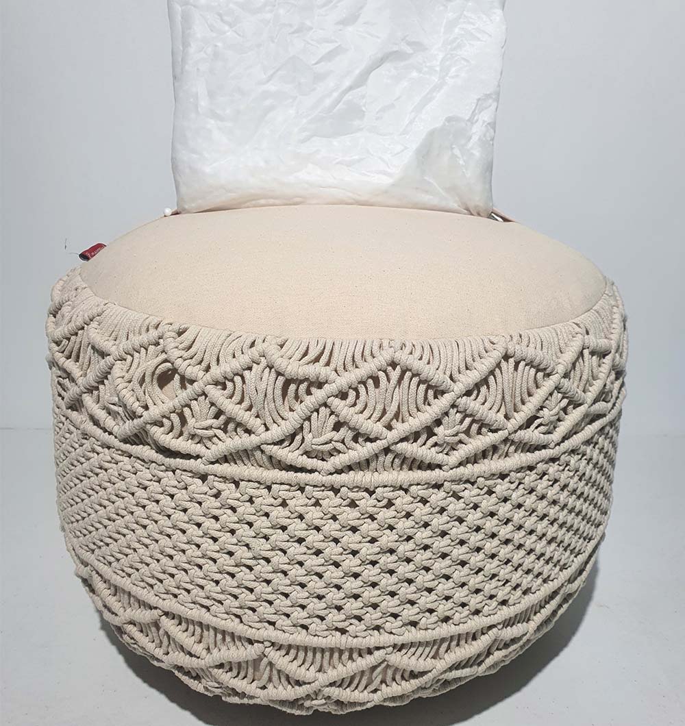 Back view of natural cotton pouf PF-073 showing round shape and woven fabric