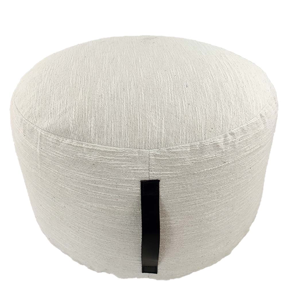 Handmade white pouf with functional handle and neutral woven design