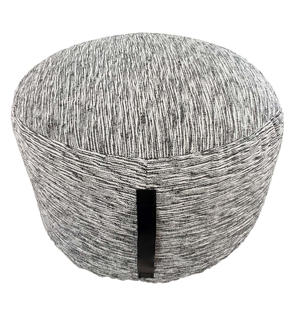Black and white pouf for indoor or outdoor décor, versatile seating option