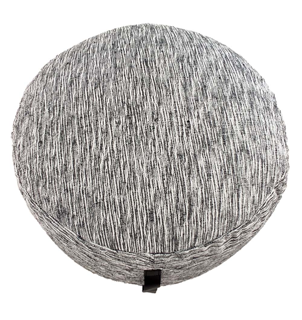 Overhead shot of black & white pouf with soft cushion and woven cotton texture