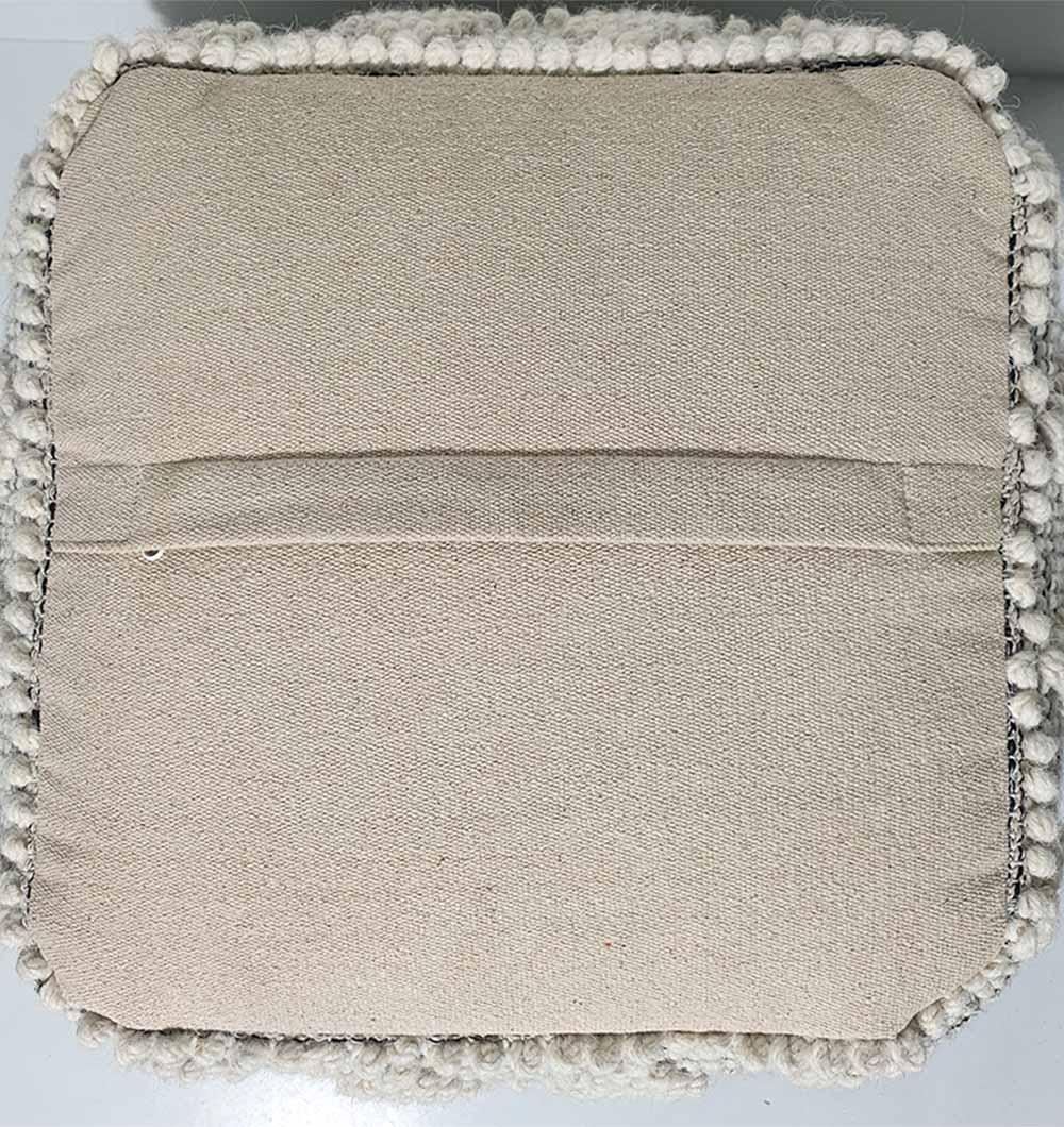 Rear side of handmade natural pouf PF-138 highlighting stitching and texture