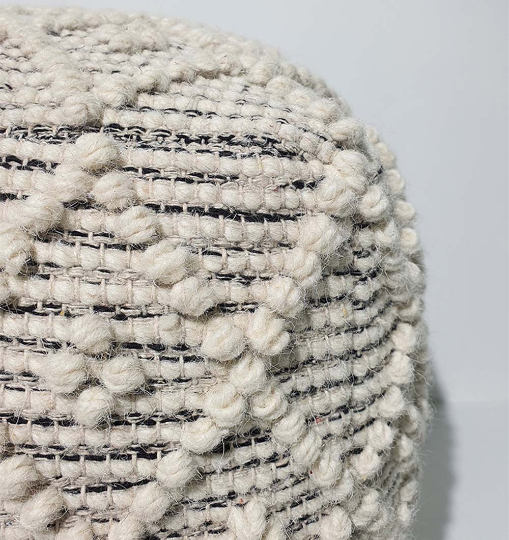 Close-up of PF-139 pouf showing handmade wool-cotton texture