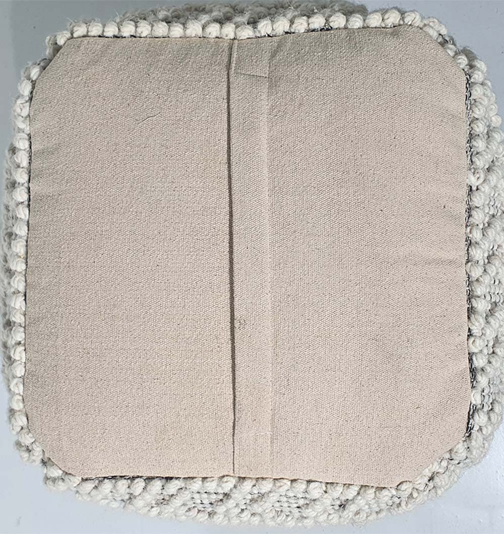 Back view of PF-141 natural color pouf showing handcrafted stitching and wool-cotton cover details