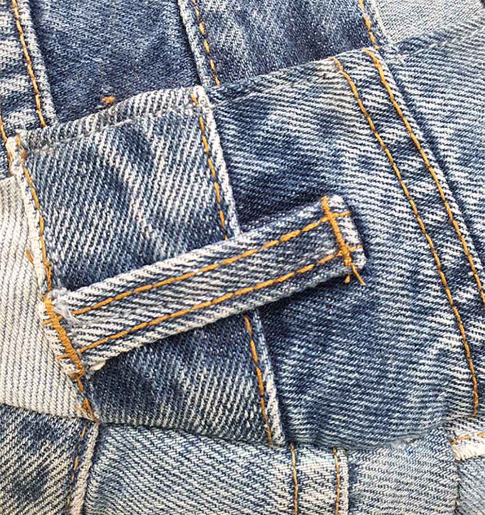 Close-up view of handmade cotton pouf PF-144 showing detailed woven texture and stitching