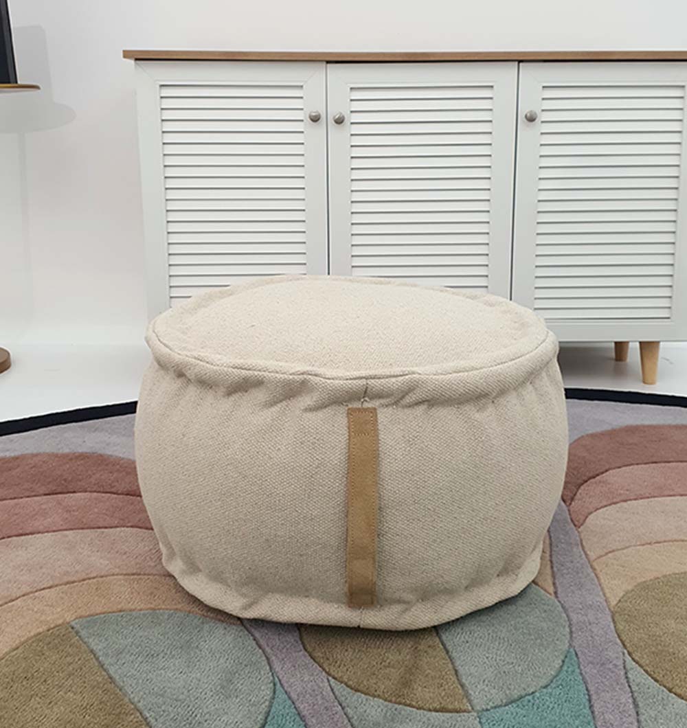 Round PF-143 pouf with 100% polyester cover and multi-color design for indoor décor