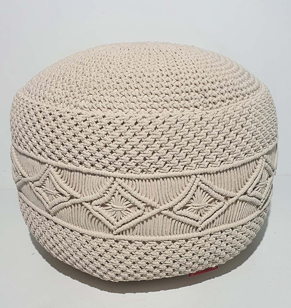 The RAMSHA HOME Round Cotton Pouf PF-072 in beige features textured patterns and diamond-shaped designs, bringing cozy seating and stylish flair to your décor. Displayed against a plain white background.
