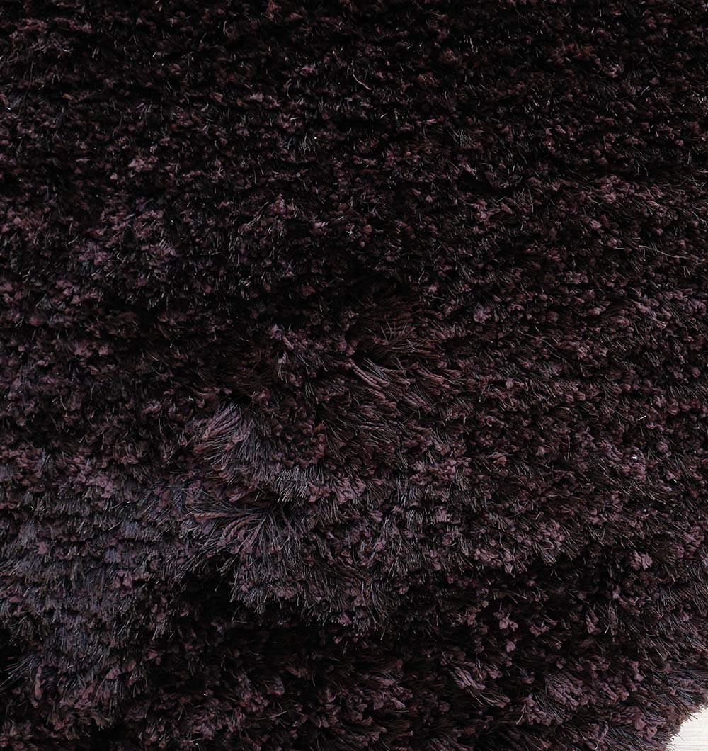 Close-up of RAMSHA HOME's Dark Brown High-Density Shaggy Rug (SG 028), showing its thick, dense fibers that create a soft and fluffy surface—ideal as a cozy area rug.