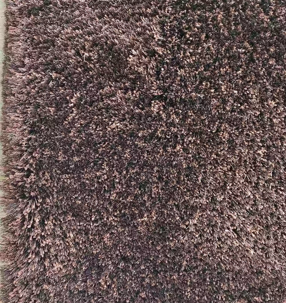 Close-up of the RAMSHA HOME Fluffy Shaggy Area Rug SG 04 - Brown Rectangle, featuring dense, plush fibers in multiple brown shades and a soft, textured appearance.