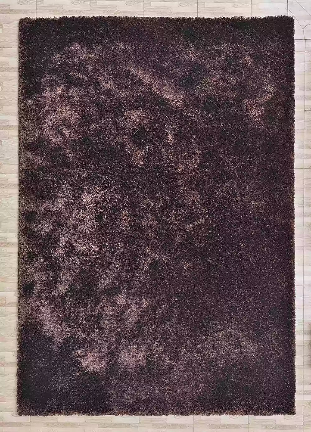The RAMSHA HOME Fluffy Shaggy Area Rug SG 04 in brown, a large rectangular rug with plush, thick texture and lighter uneven patches, lies on a light wood floor for a modern look.