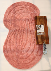 The RAMSHA HOME Gold irregular Shaped Home Decor Shaggy Rug - SG 042 3D with wavy patterns sits next to a wooden coffee table holding an open magazine and a small vase of flowers.