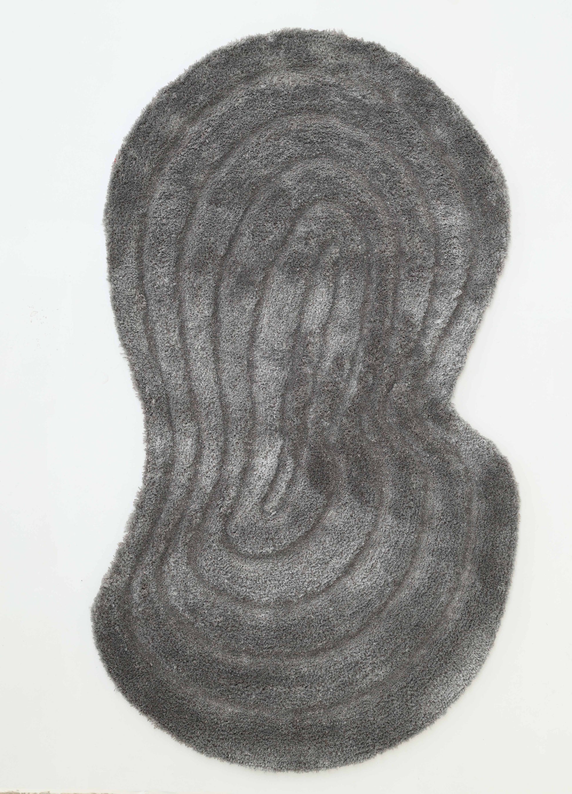 The Luxury Soft Grey Irregular Shaggy Area Rug - SG 044 3D by RAMSHA HOME features textured, wavy lines on a white background, resembling a contour map—an eye-catching modern piece for contemporary spaces.