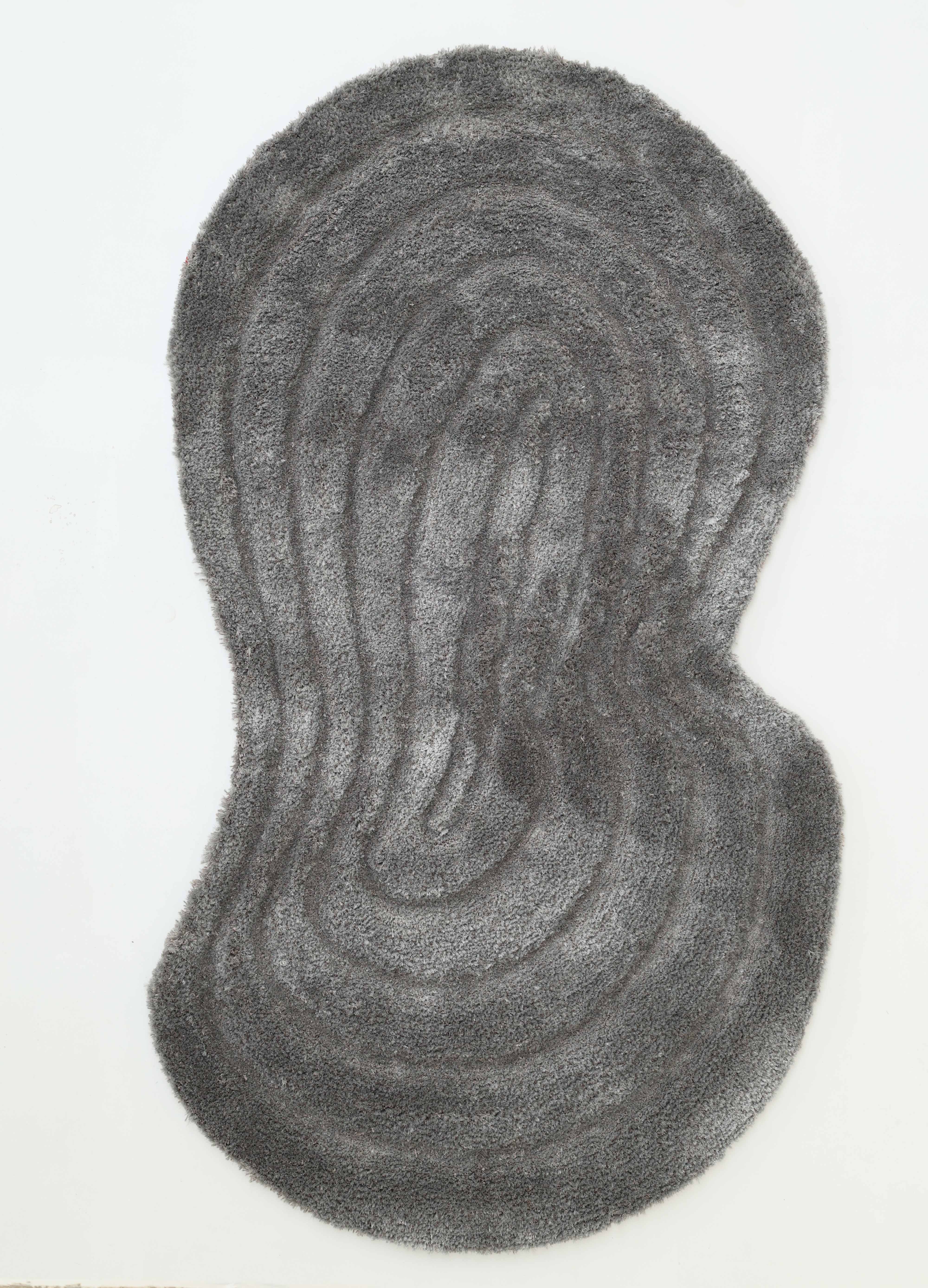 The Luxury Soft Grey Irregular Shaggy Area Rug - SG 044 3D by RAMSHA HOME features textured, wavy lines on a white background, resembling a contour map—an eye-catching modern piece for contemporary spaces.