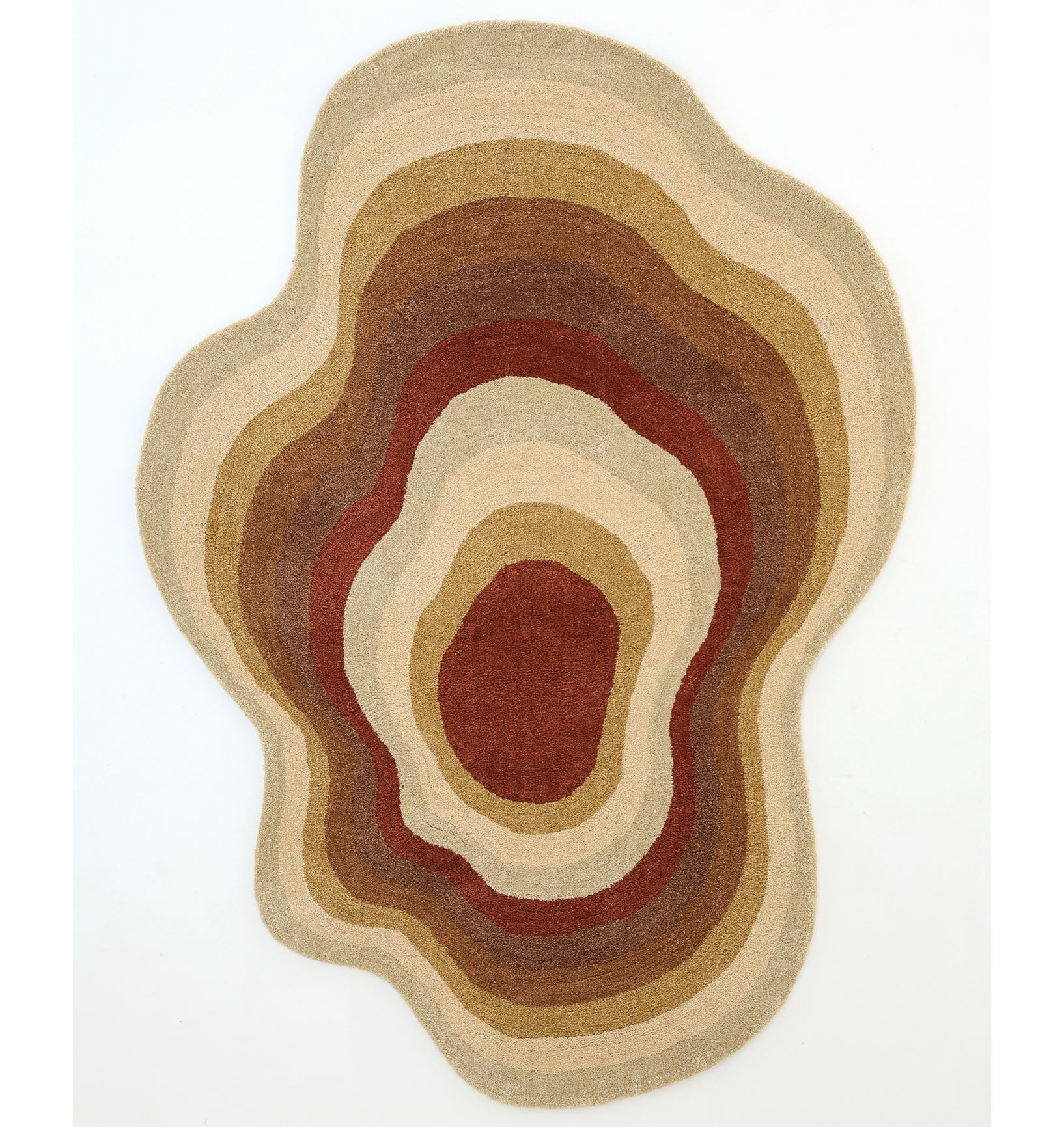 The RAMSHA HOME Modern Layered Border Irregular Soft Shaggy Carpet (SG 055) features wavy, earthy-toned bands in beige, tan, brown, and rust—evoking natural sediment layers—for a striking cozy décor accent.