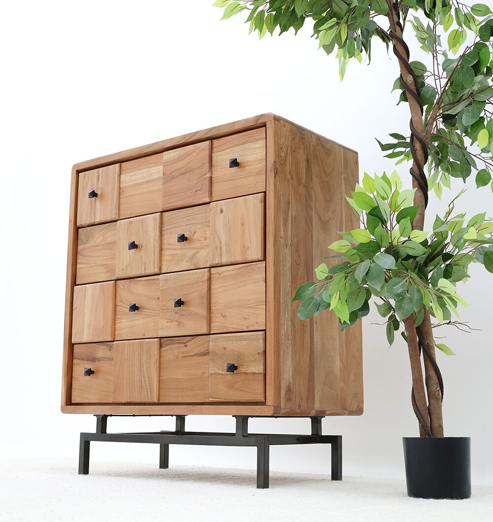 The RAMSHA HOME Natural Acacia Wood Drawer Cabinet – 8 Drawer Cabinet with black metal legs stands beside a tall potted artificial plant with green leaves against a white wall and floor.