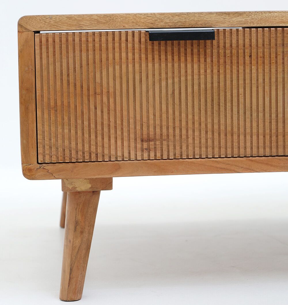 A close-up of the RAMSHA HOME Modern Industrial Acacia Wood Sideboard highlights its vertical-grooved front, black metal base, and sleek black handles against a light background.