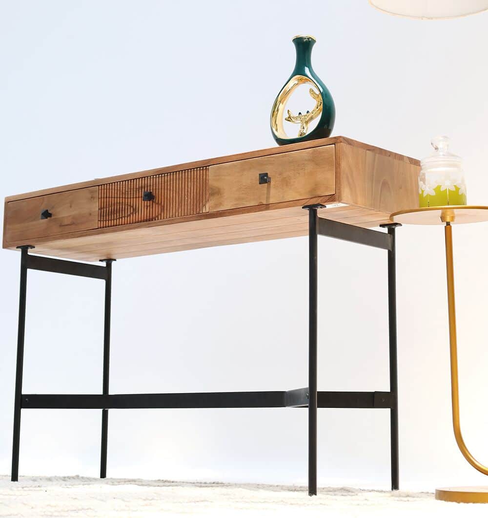 The RAMSHA HOME Wooden Sideboard Cabinet, made of solid acacia wood with a metal base, is styled with a green vase and gold accents. A round yellow side table holds a glass jar, all in a minimal, bright setting ideal for entryway organization.