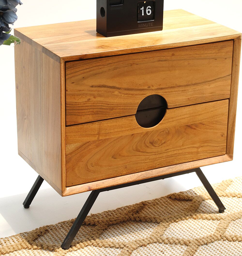 The RAMSHA HOME Solid Acacia Wood Sideboard Cabinet – 2 Drawer Storage Unit with black angled legs sits on a woven rug, topped with a small black clock.