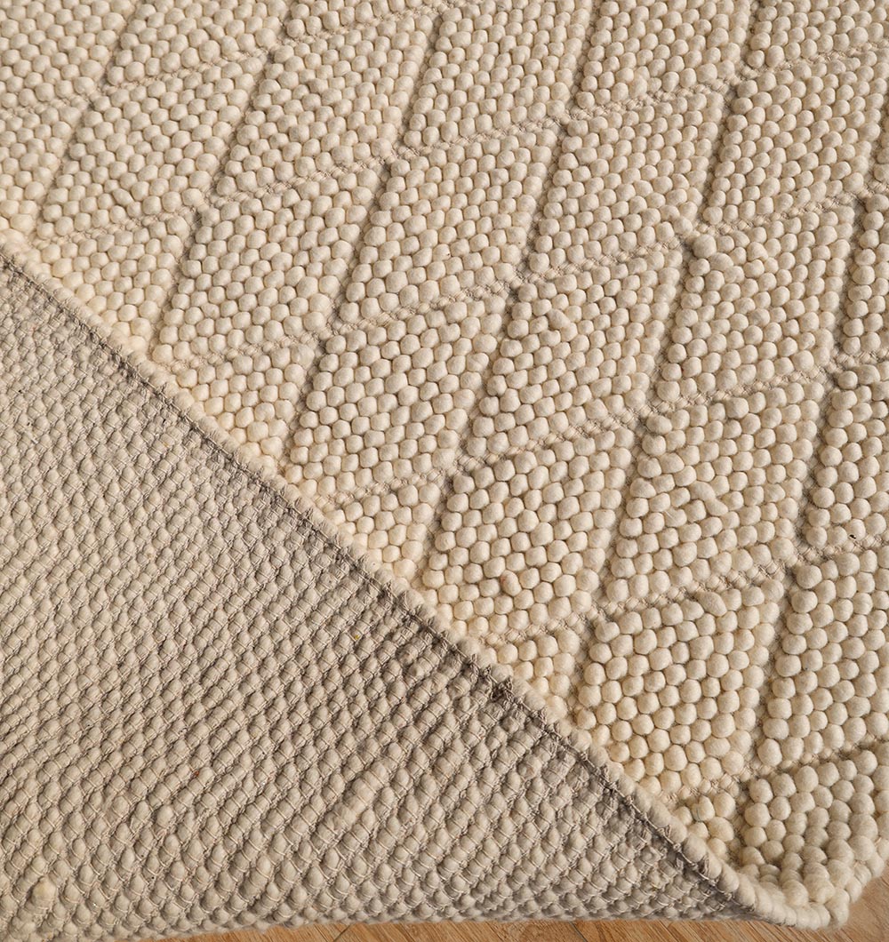 Reverse image highlighting the tight weaving foundation and structural integrity of the durable woven area rug.