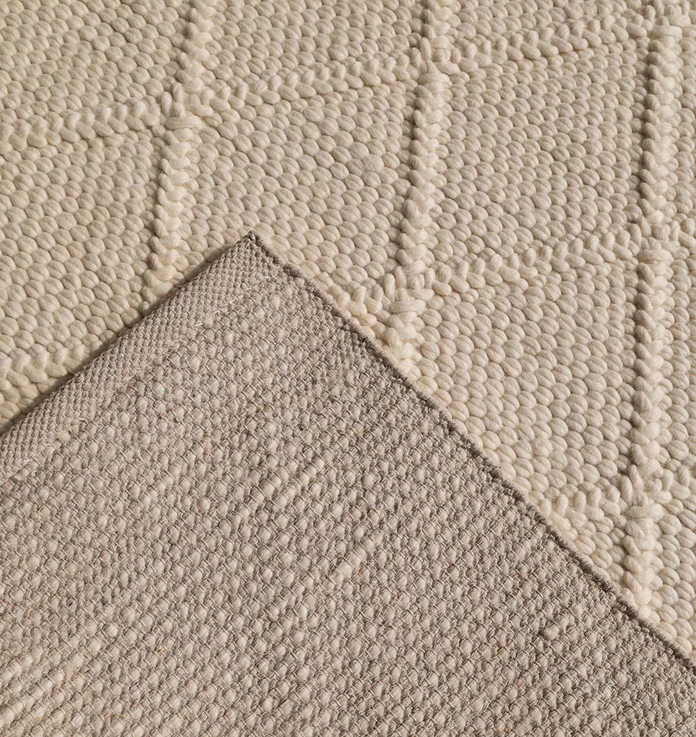 Reverse side revealing the intricate backing and robust foundation, a testament to its handcrafted quality.