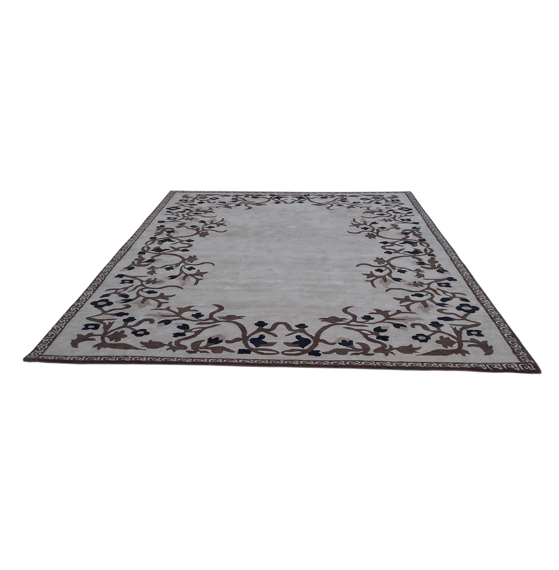 The RAMSHA HOME Traditional Home Decor Handmade Carpet – HTW-34 is a rectangular beige wool rug with a hand-tufted light gray center, traditional border, and brown and black floral vine patterns, displayed flat on a white background.