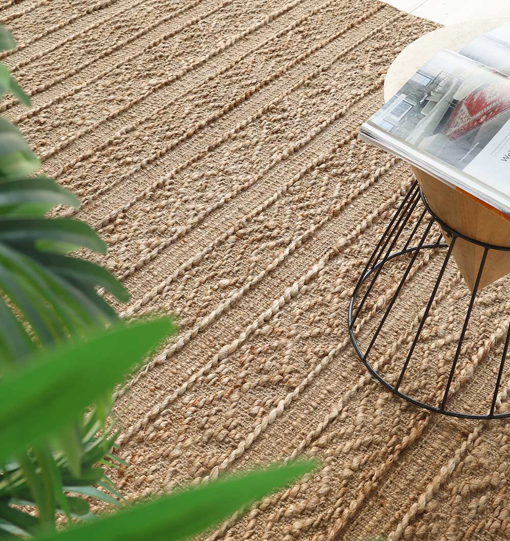 Close-up of the expertly woven texture next to decorative items, emphasizing its visual distinction.