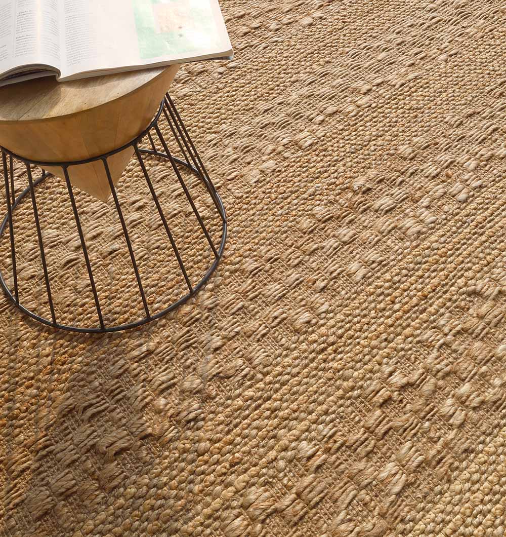 Detailed view of the pure jute fibers, durable and soft, perfect for grounding home decor.