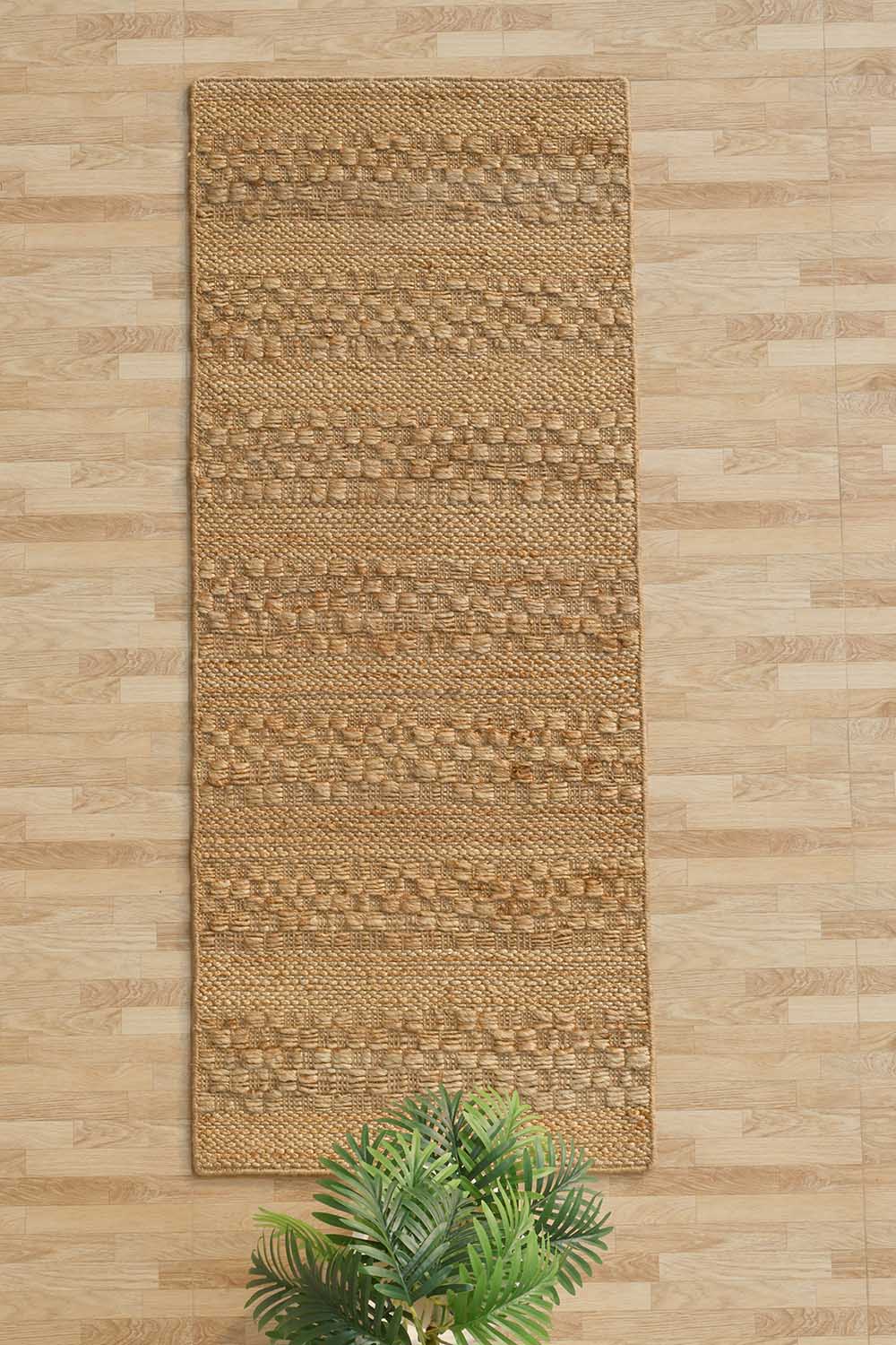 Natural color home decor rug providing a warm, earthy aesthetic in a modern interior setting.