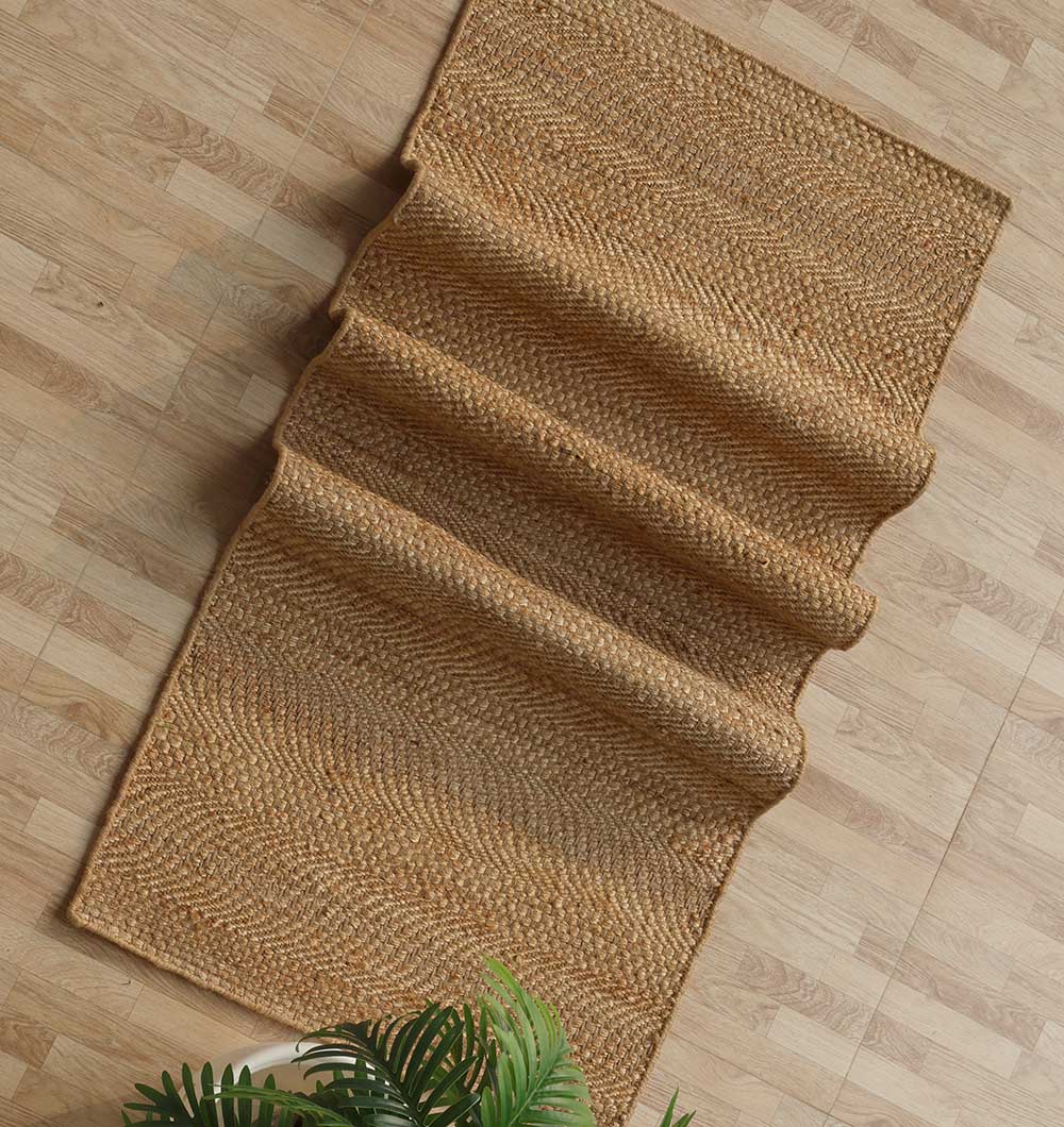 Top view of the elongated Jute runner, serving as a versatile piece with warm neutral tones.
