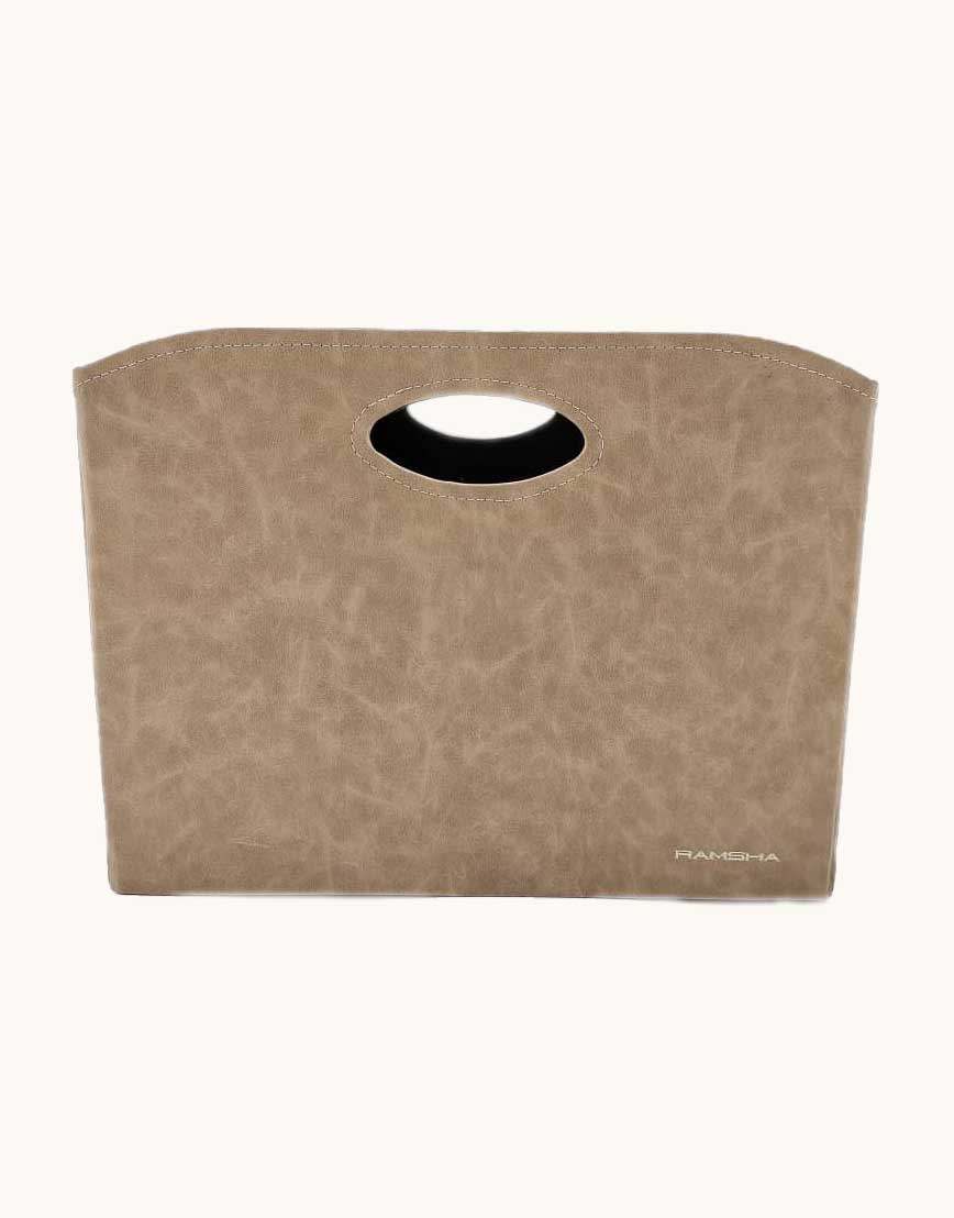The Ivory Handmade Polyester Basket (35x20x27cm) by Ramsha Home features a rectangular shape, cut-out handle, marbled textured surface, and is ideal for versatile storage or home organization.