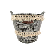 The Ramsha Home White and Black Handmade Cotton Basket with Handle (BS 009, 25x20x25cm) is ideal for nursery organization or as a toy storage basket, adding a stylish touch to your space.