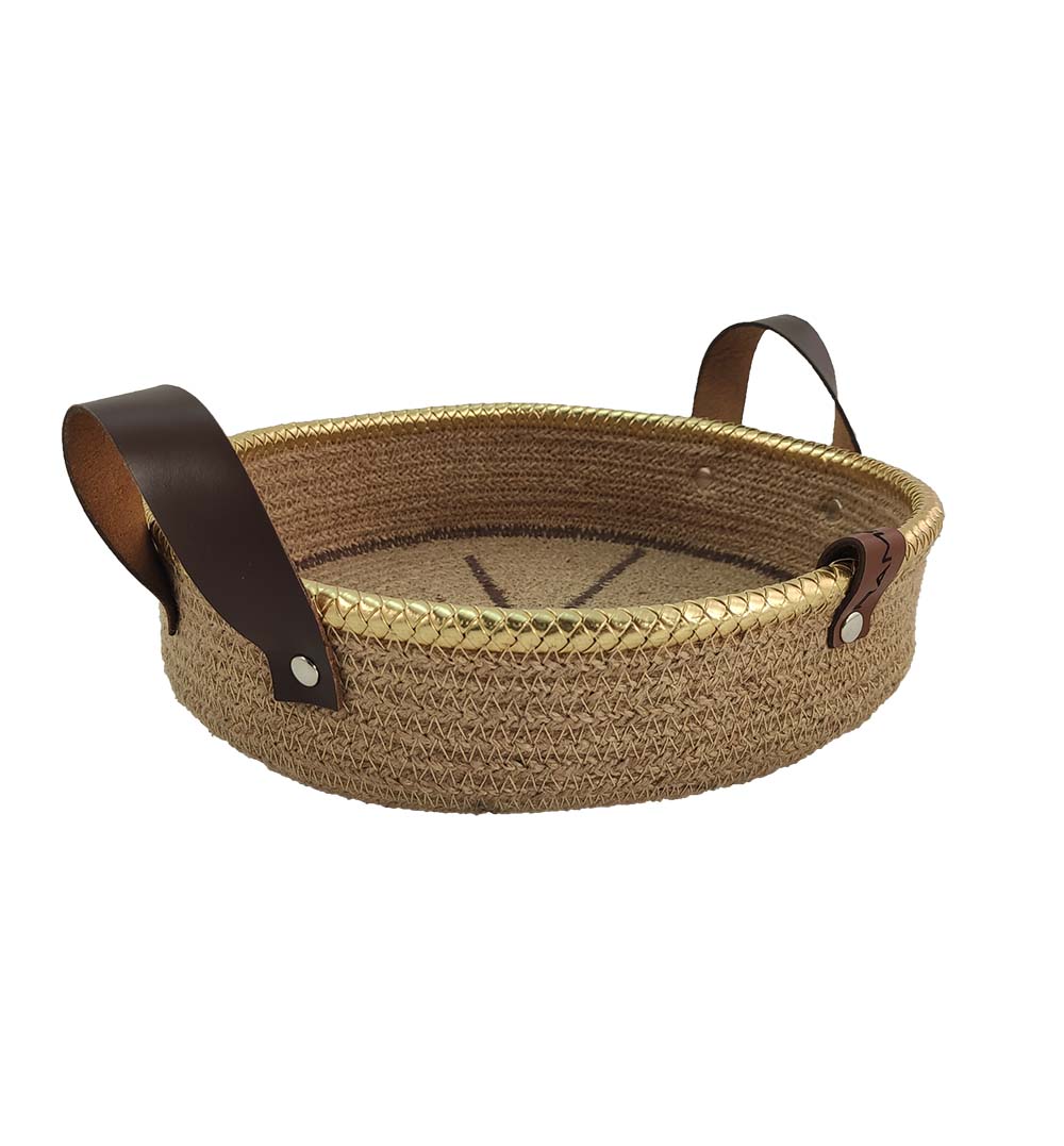 The Ramsha Home Natural Jute Basket with Leather Handle (BS 011, 28x7cm) features a handmade round design, rustic texture, flat base, and two dark brown leather handles with metal rivets—perfect for organizing any kitchen.