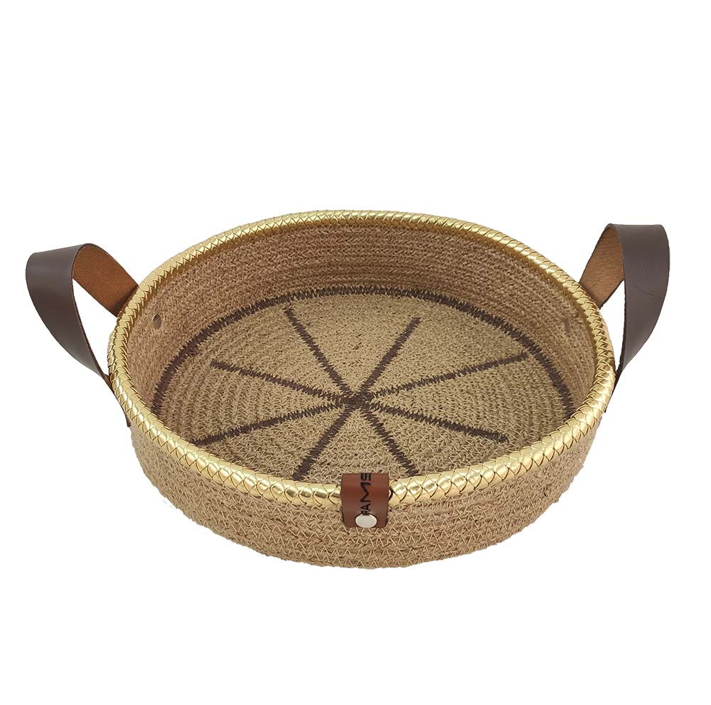 The Natural Jute Basket with Leather Handle- BS 011 (28x7cm) by Ramsha Home features a sunburst base, gold trim, and two brown leather handles—ideal as a stylish storage basket or kitchen organizer for your home.