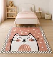 A children’s bedroom features RAMSHA HOME’s Pink Cat Kids Rug - Cute Kitten Nursery Area Carpet KD-002 (120x180cm), a whimsical cat-face design with stars and hearts, pink bedding, teddy bear decor, and cozy neutral tones.