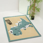 The RAMSHA HOME Kids Rug Soft Dinosaur Character Rug (120x180 cm – KD 018) features a playful dinosaur and "HELLO" in black letters, creating a cheerful accent for any kids room.