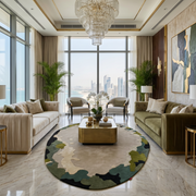 A luxurious modern living room with large windows, two elegant sofas, a marble coffee table with flowers, potted plants, a chandelier, and the RAMSHA HOME Terra Eclipse Oval Handmade Rug Accent Rug HTWV-201.