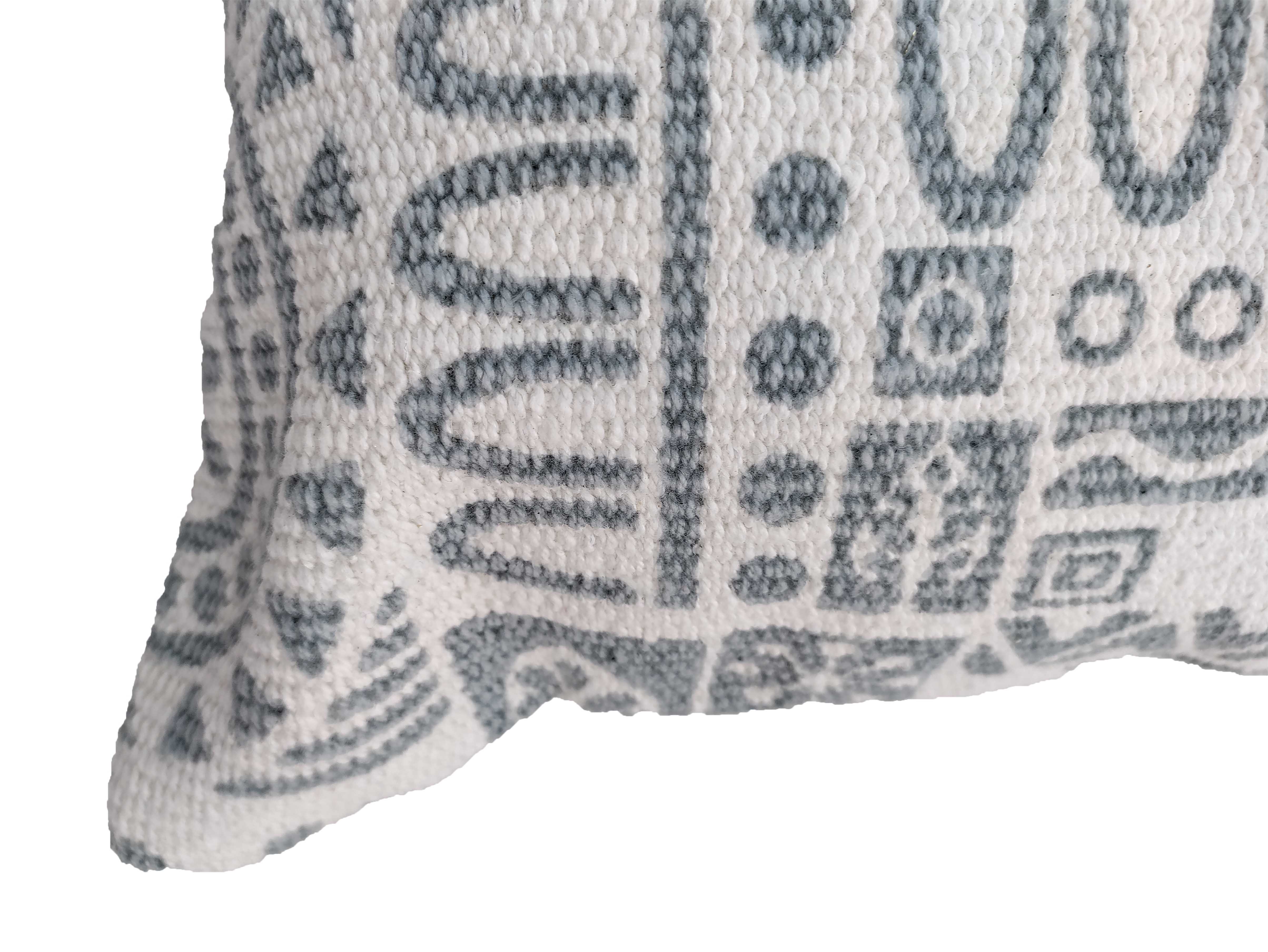 The RAMSHA HOME Grey and White Cotton Cushion CS-182 features textured white fabric with abstract grey geometric patterns. Only a section of this stylish cushion is shown against a white background.
