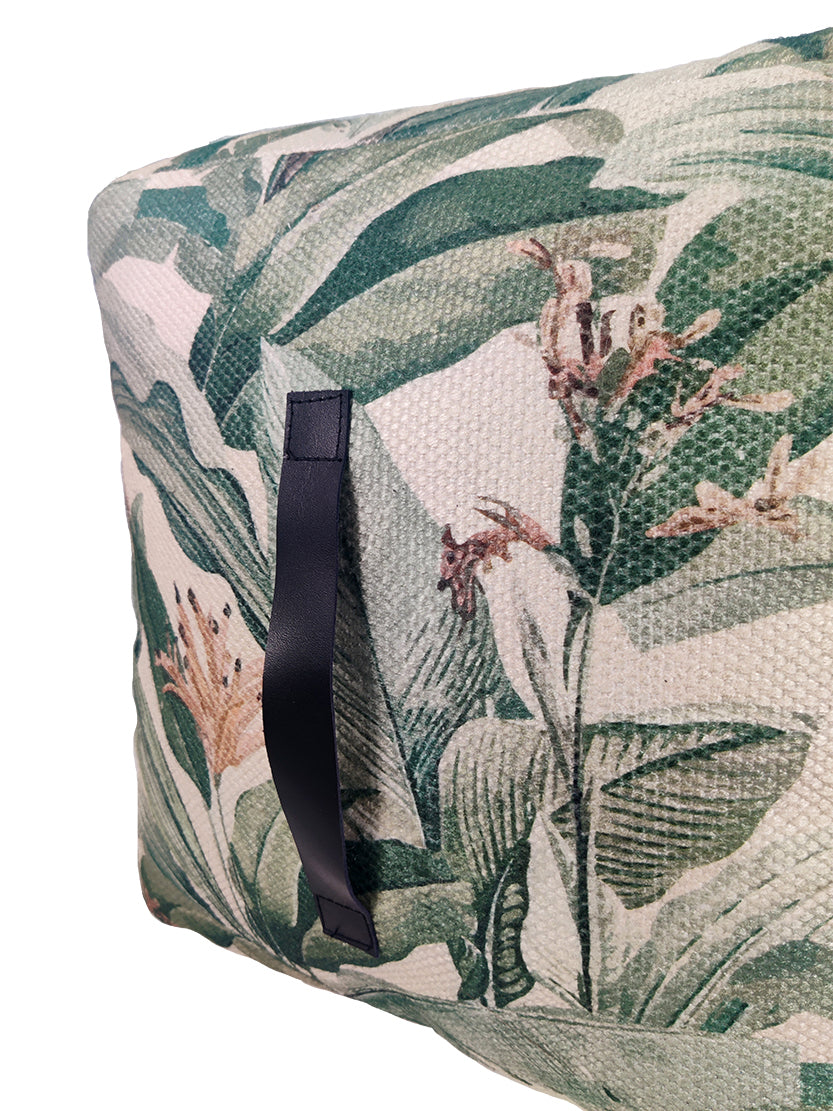 Detailed view of handmade green pouf highlighting vibrant fabric weave